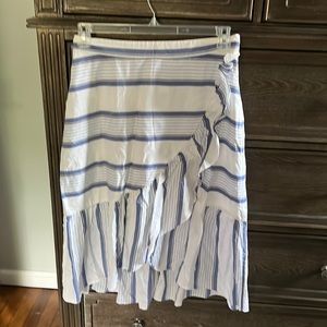 Below the knee skirt with pretty periwinkle and white.